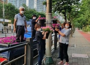 용인시 동백2동, 주민제안 공모 선정···가로등 꽃길 조성