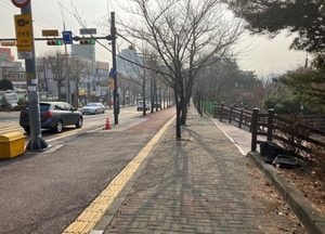 수원시, 광교산로 혼잡 구간 2차로 확장 공사 착수...보행로·자전거도로도 함께 정비