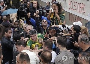 브라질 대선 투표시간 '2시간 연장'...악천후 등 영향